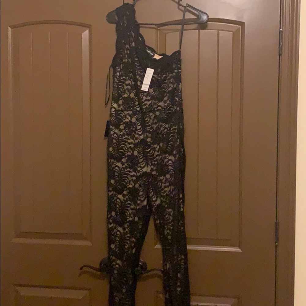 Bebe brand new beautiful lace jump suit